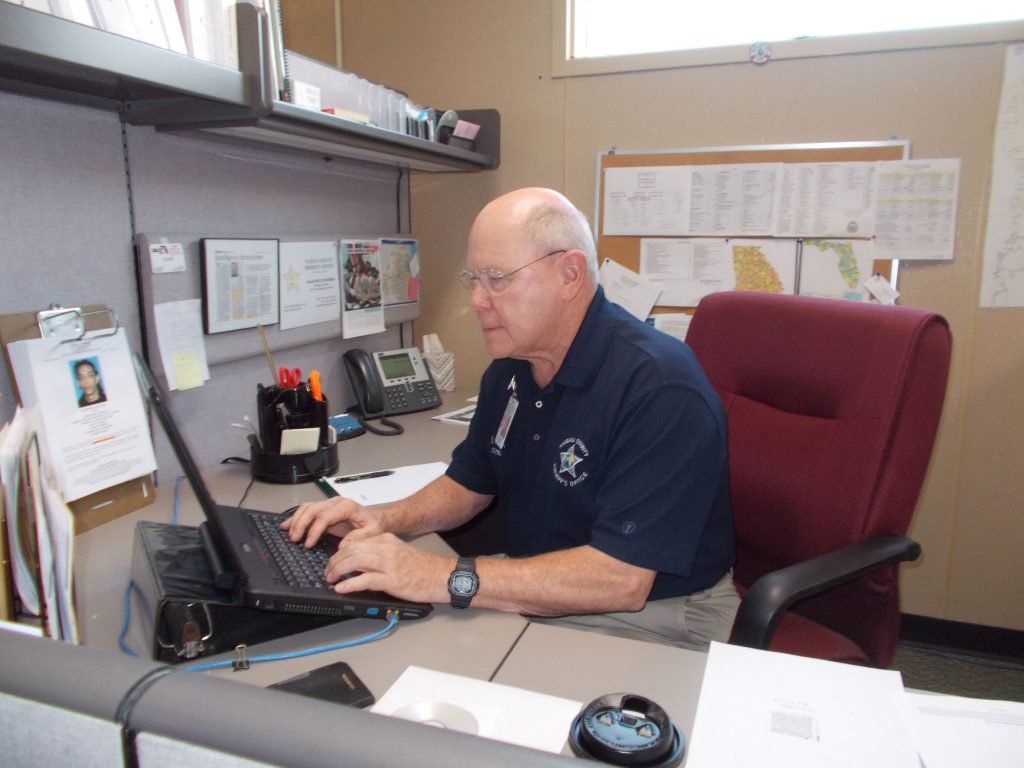 Buz Stevensen using a laptop
