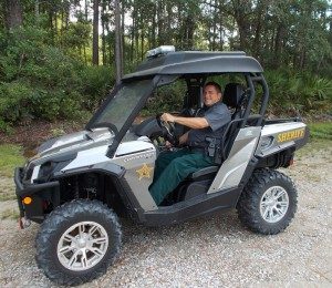 An officer in a four-wheeler