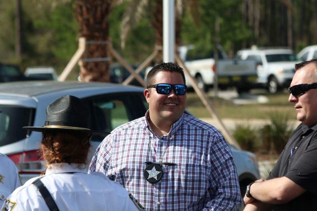 Man in sunglasses smiling