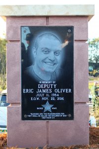 Memorial to Deputy Eric Oliver with his portrait