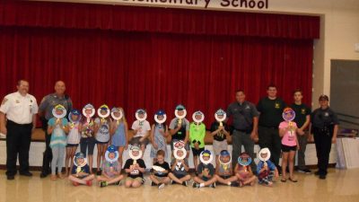 Children posing for a photo at the NCSO safe kids academy